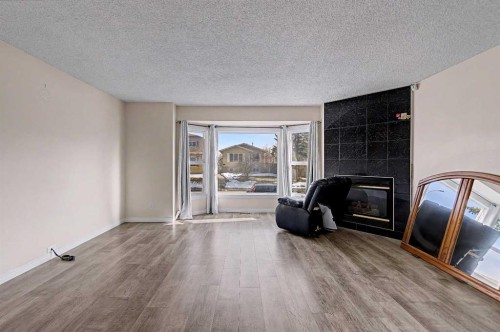 48 Whitworth Way Ne, Calgary, AB - Indoor With Fireplace