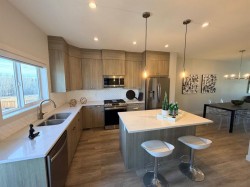 224 River Heights Drive Cochrane, AB T4C 2T8