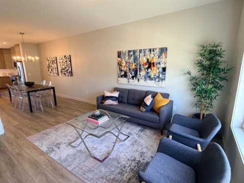224 River Heights Drive, Cochrane, AB - Indoor Photo Showing Living Room