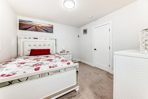127 Saddlecrest Grove Ne, Calgary, AB - Indoor Photo Showing Bedroom