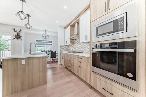 127 Saddlecrest Grove Ne, Calgary, AB - Indoor Photo Showing Kitchen With Upgraded Kitchen