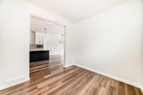 84 Evansfield Close Nw, Calgary, AB - Indoor Photo Showing Other Room