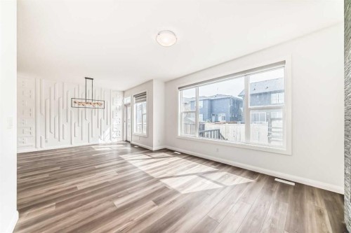 84 Evansfield Close Nw, Calgary, AB - Indoor Photo Showing Other Room