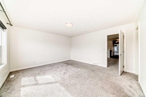 84 Evansfield Close Nw, Calgary, AB - Indoor Photo Showing Other Room