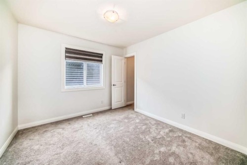 84 Evansfield Close Nw, Calgary, AB - Indoor Photo Showing Other Room