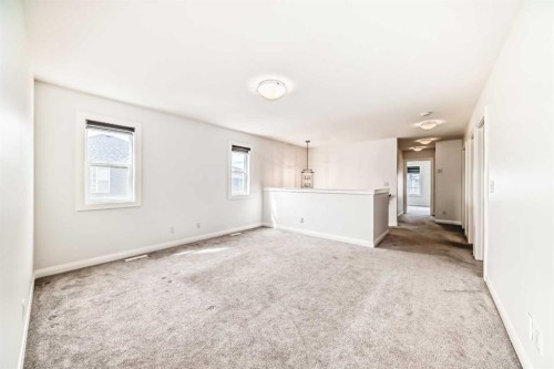 84 Evansfield Close Nw, Calgary, AB - Indoor Photo Showing Other Room