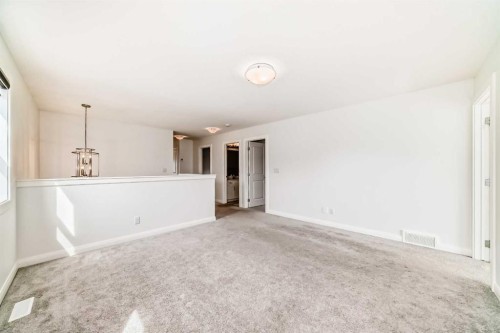 84 Evansfield Close Nw, Calgary, AB - Indoor Photo Showing Other Room