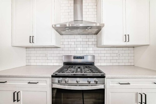 84 Evansfield Close Nw, Calgary, AB - Indoor Photo Showing Kitchen With Upgraded Kitchen