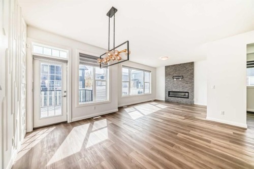 84 Evansfield Close Nw, Calgary, AB - Indoor With Fireplace