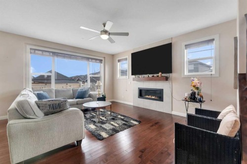 194 Redstone Park Ne, Calgary, AB - Indoor Photo Showing Living Room With Fireplace