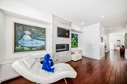 2412 28 Avenue Sw, Calgary, AB - Indoor Photo Showing Living Room With Fireplace