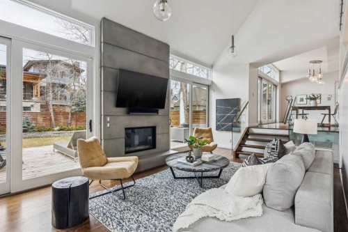 3905 Edison Crescent Sw, Calgary, AB - Indoor Photo Showing Living Room With Fireplace