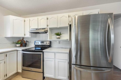47 Hawkstone Drive Nw, Calgary, AB - Indoor Photo Showing Kitchen With Stainless Steel Kitchen