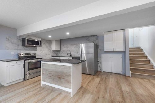 47 Hawkstone Drive Nw, Calgary, AB - Indoor Photo Showing Kitchen With Stainless Steel Kitchen With Upgraded Kitchen