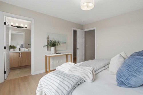 85 Wild Rose Way Se, Calgary, AB - Indoor Photo Showing Bedroom