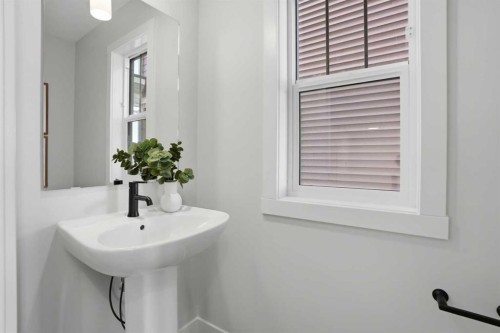 85 Wild Rose Way Se, Calgary, AB - Indoor Photo Showing Bathroom