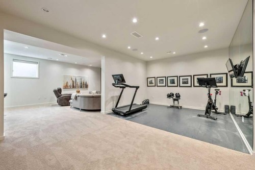 122 13 Street Ne, Calgary, AB - Indoor Photo Showing Gym Room