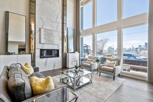 122 13 Street Ne, Calgary, AB - Indoor Photo Showing Living Room With Fireplace
