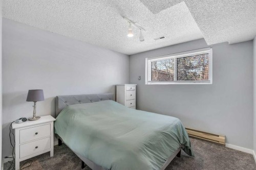 12 Oakvale Place Sw, Calgary, AB - Indoor Photo Showing Bedroom