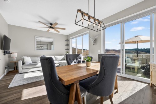 205 Sunset Point, Cochrane, AB - Indoor Photo Showing Dining Room