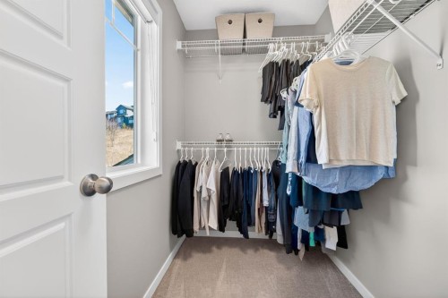 205 Sunset Point, Cochrane, AB - Indoor With Storage