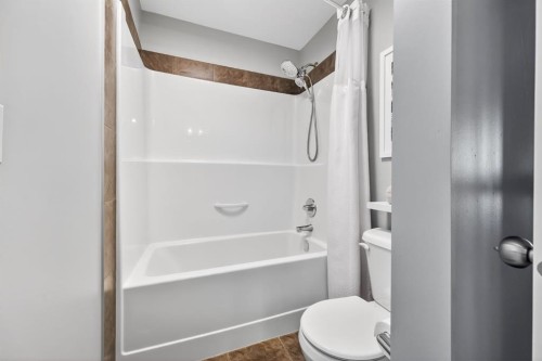 205 Sunset Point, Cochrane, AB - Indoor Photo Showing Bathroom