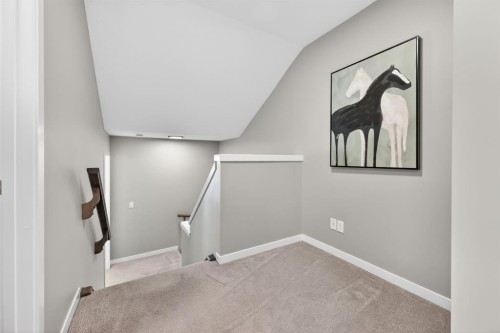 205 Sunset Point, Cochrane, AB - Indoor Photo Showing Other Room