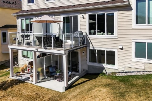 205 Sunset Point, Cochrane, AB - Outdoor With Deck Patio Veranda With Exterior