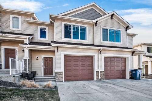 205 Sunset Point, Cochrane, AB - Outdoor With Facade