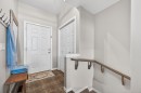 205 Sunset Point, Cochrane, AB  - Indoor Photo Showing Other Room 