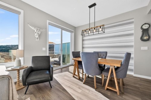 205 Sunset Point, Cochrane, AB - Indoor Photo Showing Dining Room