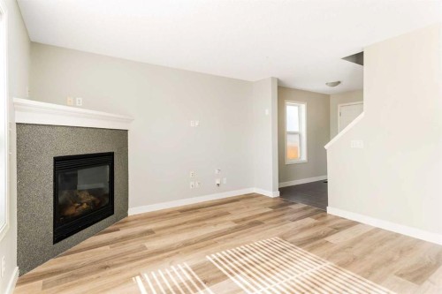 185 Copperfield Common Se, Calgary, AB - Indoor With Fireplace