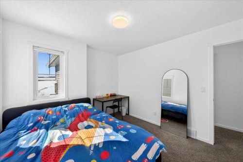 20 Nolancrest Green Nw, Calgary, AB - Indoor Photo Showing Bedroom