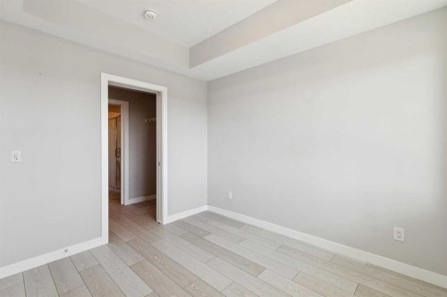 1305-111 Wolf Creek Drive Se, Calgary, AB - Indoor Photo Showing Other Room