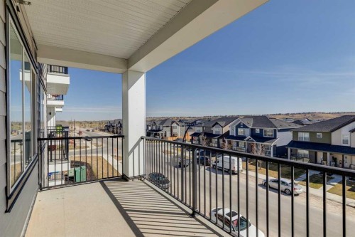 1305-111 Wolf Creek Drive Se, Calgary, AB - Outdoor With Balcony With Exterior