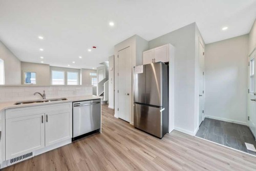 401 Strathcona Circle, Strathmore, AB - Indoor Photo Showing Kitchen With Stainless Steel Kitchen With Double Sink