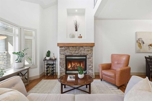 4014 Patricia Landing Sw, Calgary, AB - Indoor Photo Showing Living Room With Fireplace