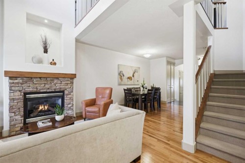 4014 Patricia Landing Sw, Calgary, AB - Indoor Photo Showing Living Room With Fireplace