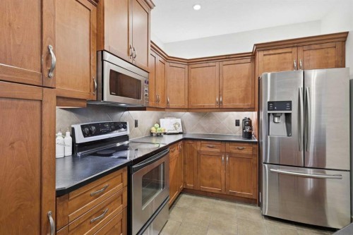 4014 Patricia Landing Sw, Calgary, AB - Indoor Photo Showing Kitchen With Stainless Steel Kitchen