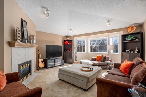 15 Valley Brook Circle Nw, Calgary, AB - Indoor Photo Showing Living Room With Fireplace