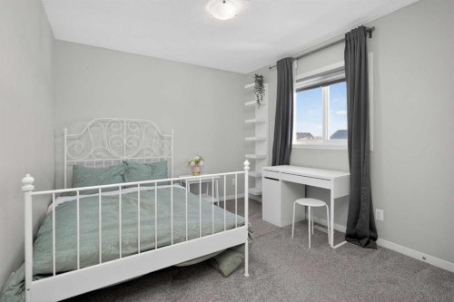 31 Lucas Boulevard Nw, Calgary, AB - Indoor Photo Showing Bedroom