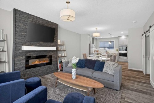31 Lucas Boulevard Nw, Calgary, AB - Indoor Photo Showing Living Room With Fireplace