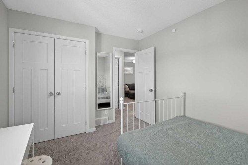 31 Lucas Boulevard Nw, Calgary, AB - Indoor Photo Showing Bedroom