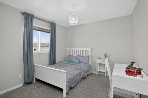 31 Lucas Boulevard Nw, Calgary, AB - Indoor Photo Showing Bedroom