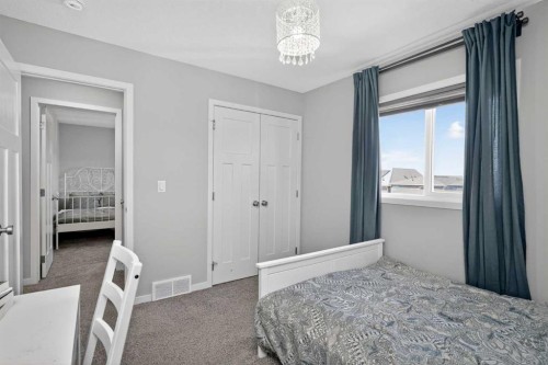 31 Lucas Boulevard Nw, Calgary, AB - Indoor Photo Showing Bedroom