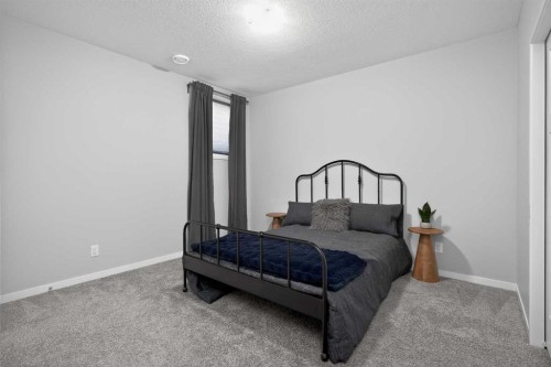 31 Lucas Boulevard Nw, Calgary, AB - Indoor Photo Showing Bedroom
