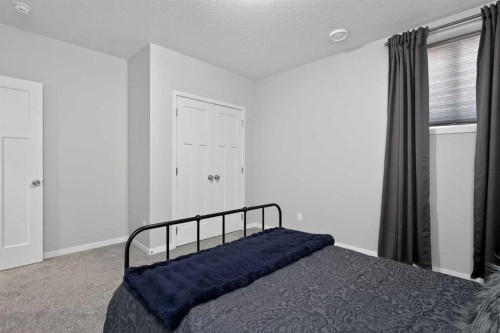 31 Lucas Boulevard Nw, Calgary, AB - Indoor Photo Showing Bedroom