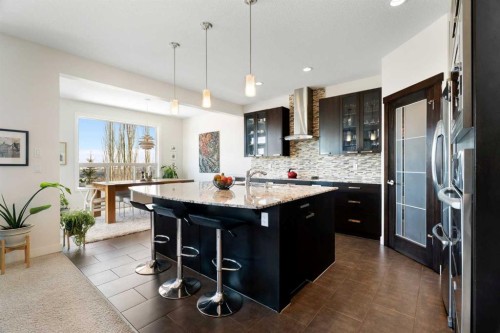 61 Cougar Ridge Cove Sw, Calgary, AB - Indoor Photo Showing Kitchen With Upgraded Kitchen