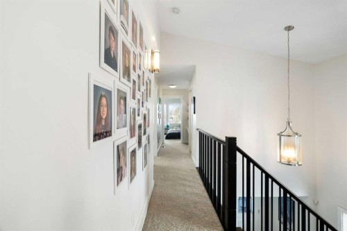 61 Cougar Ridge Cove Sw, Calgary, AB - Indoor Photo Showing Other Room