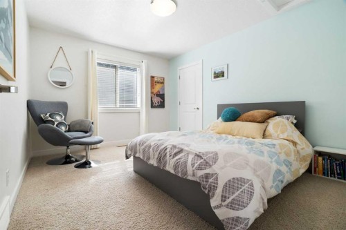61 Cougar Ridge Cove Sw, Calgary, AB - Indoor Photo Showing Bedroom